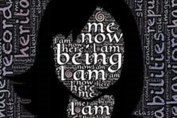 Black and white woman's silhouette with various words throughout the background