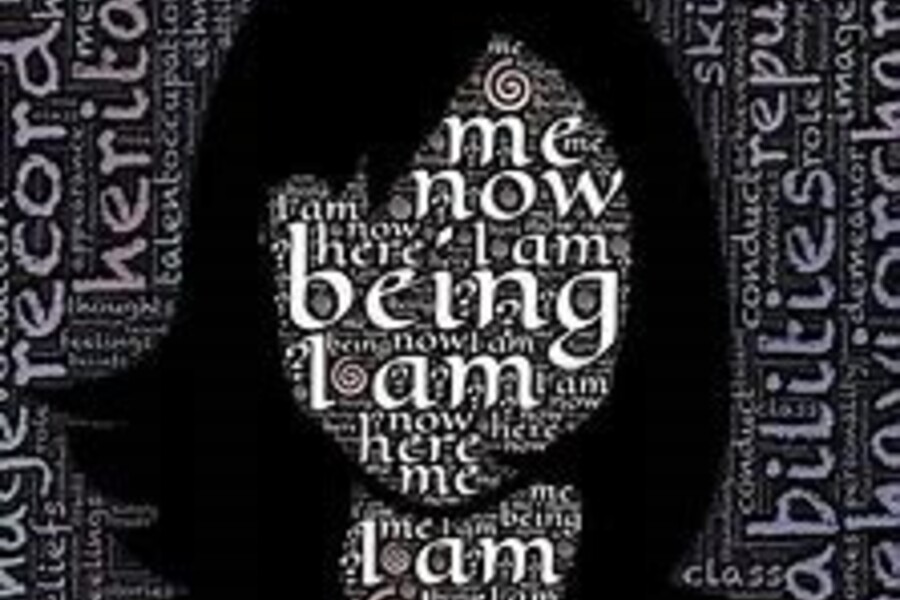 Black and white woman's silhouette with various words throughout the background
