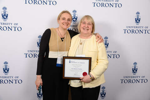 Award recipient receiving their award.