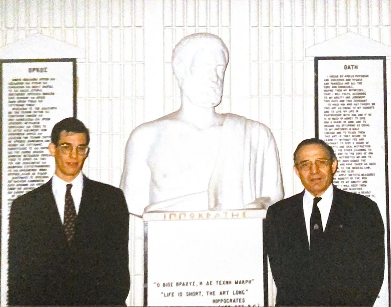 Drs. George and Dimitrios Oreopoulos in U of T’s Medical Science Building shortly before George’s graduation from the MD Program. Dimitrios imported the statue of Hippocrates that stands behind them from Greece and donated it to University.