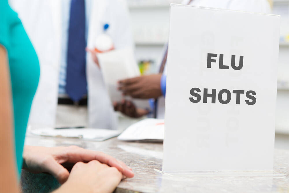 A sign saying, "Flu shots"