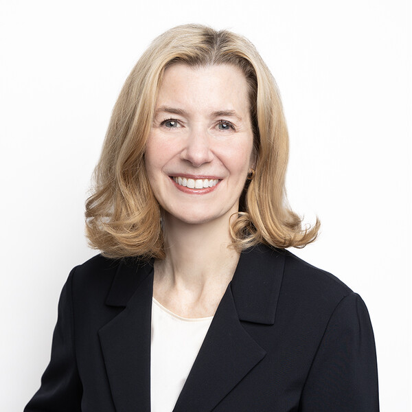 Headshot of Dr. Moira Kapral in a suit